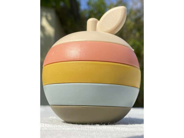 Jouet pomme en silicone – douceur apaisante pour bébé
